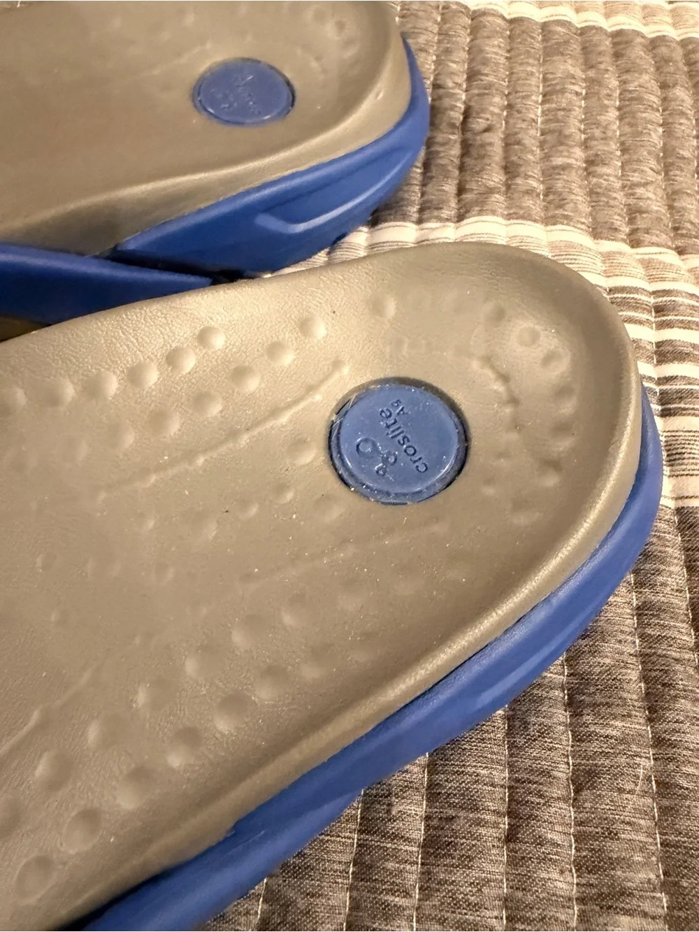 NWOT Crocs Men’s 9/women’s 11 Blue and Gray Slide Sandals